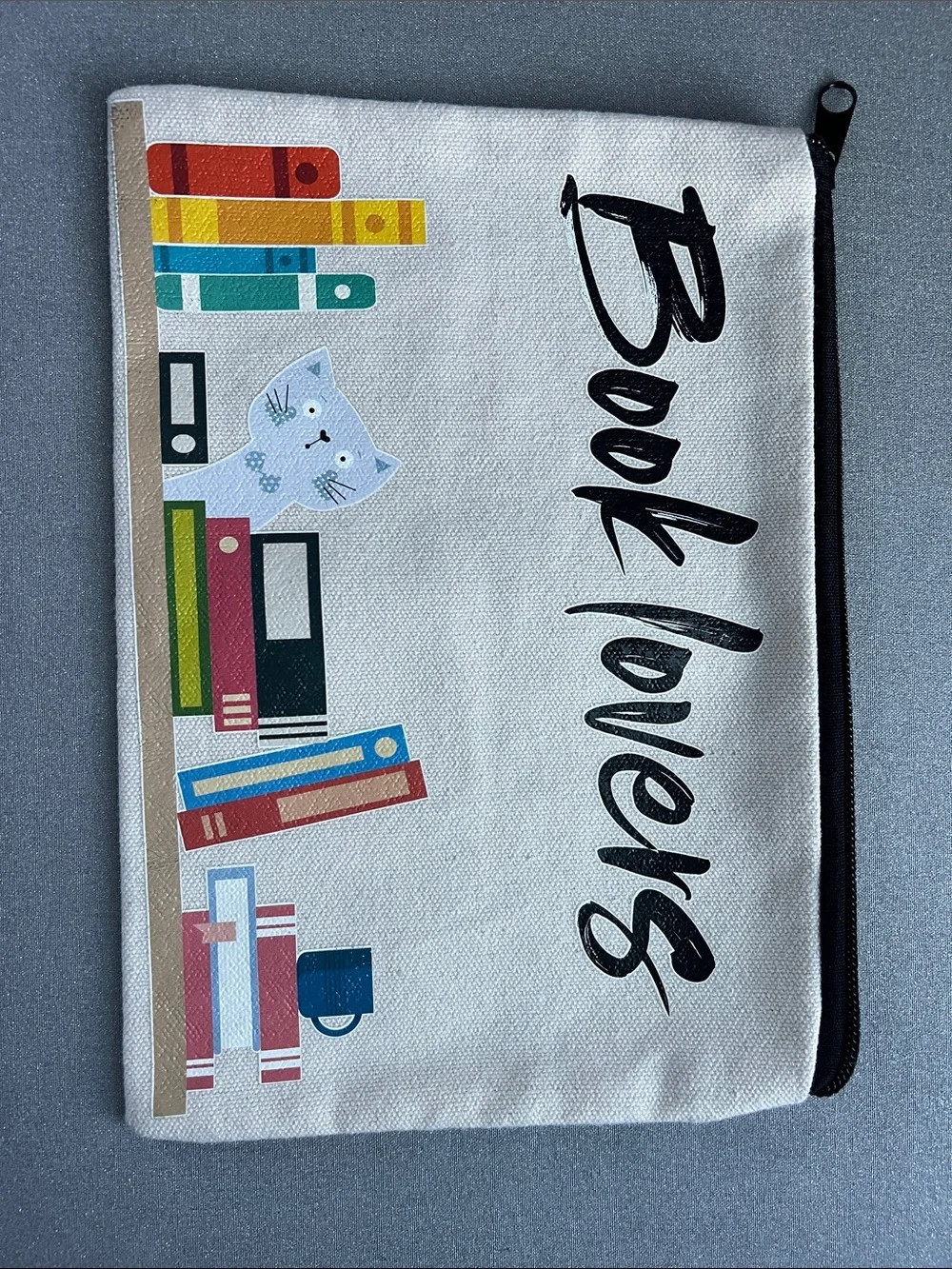 Book Lovers Canvas Zipper Pouch with Colorful Book Print Size 9” L x 6.5” W